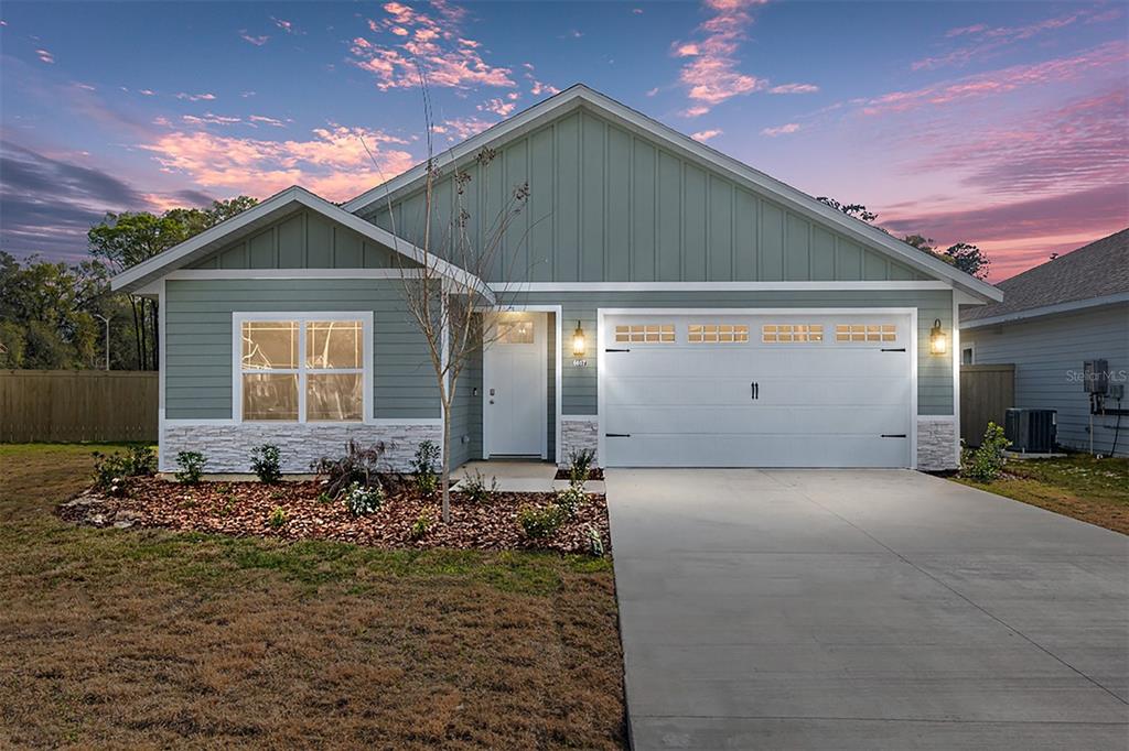 6772 Southwest 13th Lane Gainesville, FL 32607 - Photo 1 of 1 a front view of a house