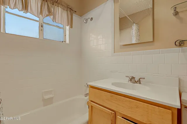 a bathroom with a sink and a bathtub