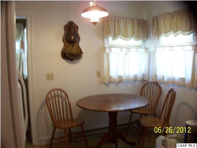 51 Repton Mill Road Aroda, VA 22709 - Photo 33 of 36 a view of a dining room with furniture and a window