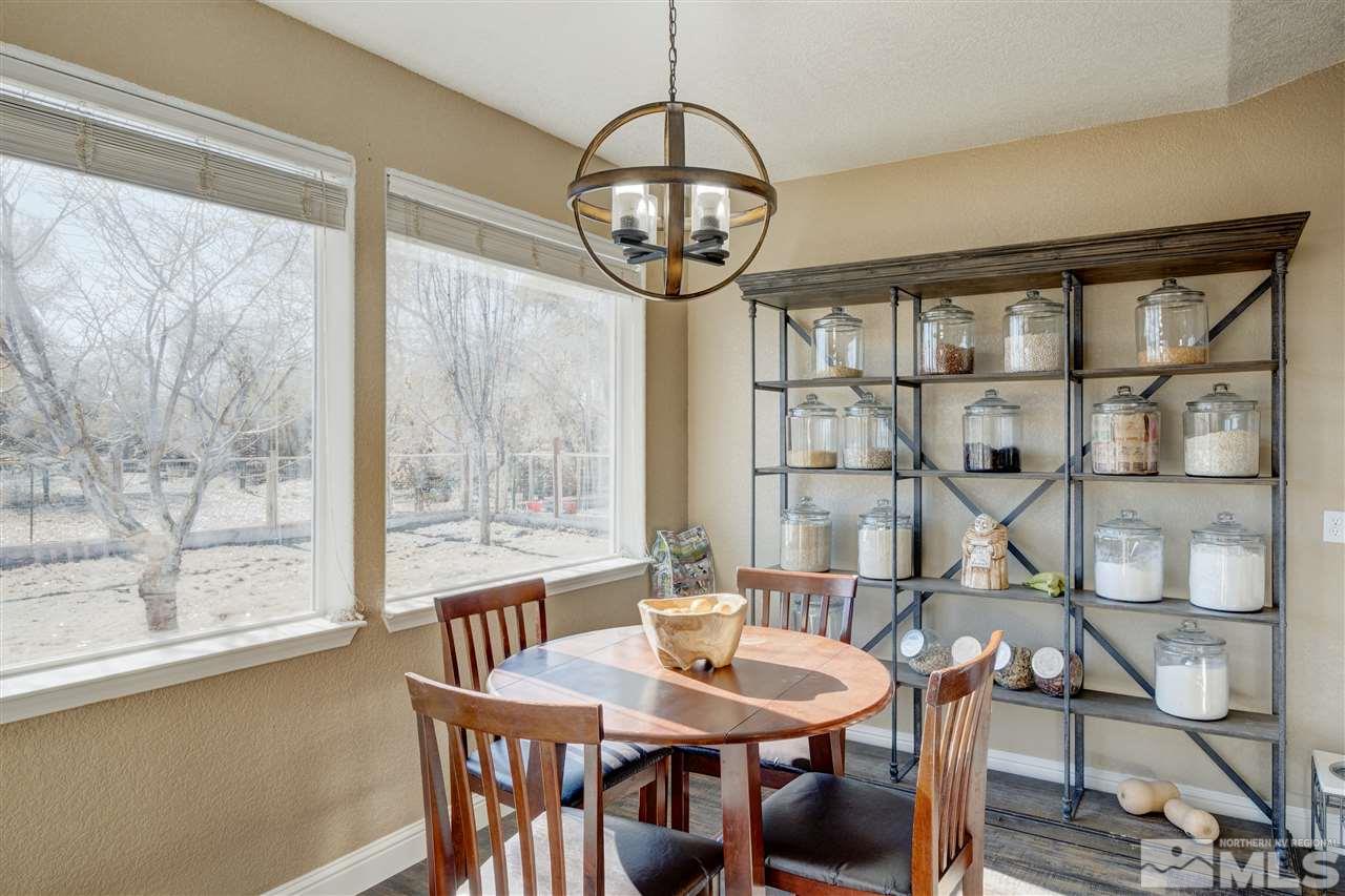 4925 Rancheria Road Fallon, NV 89406 - Photo 18 of 39 a view of a dining room with furniture window and outside view
