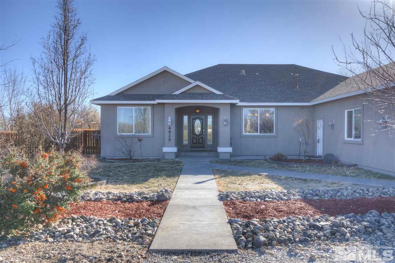 4925 Rancheria Road Fallon, NV 89406 - Photo 2 of 39 a front view of a house with yard