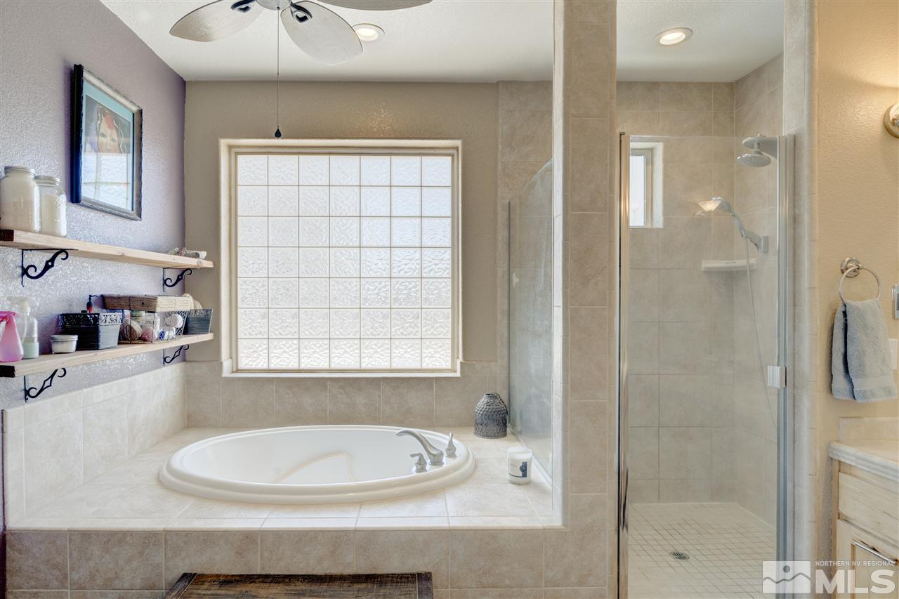 4925 Rancheria Road Fallon, NV 89406 - Photo 22 of 39 a bathroom with a sink and a mirror