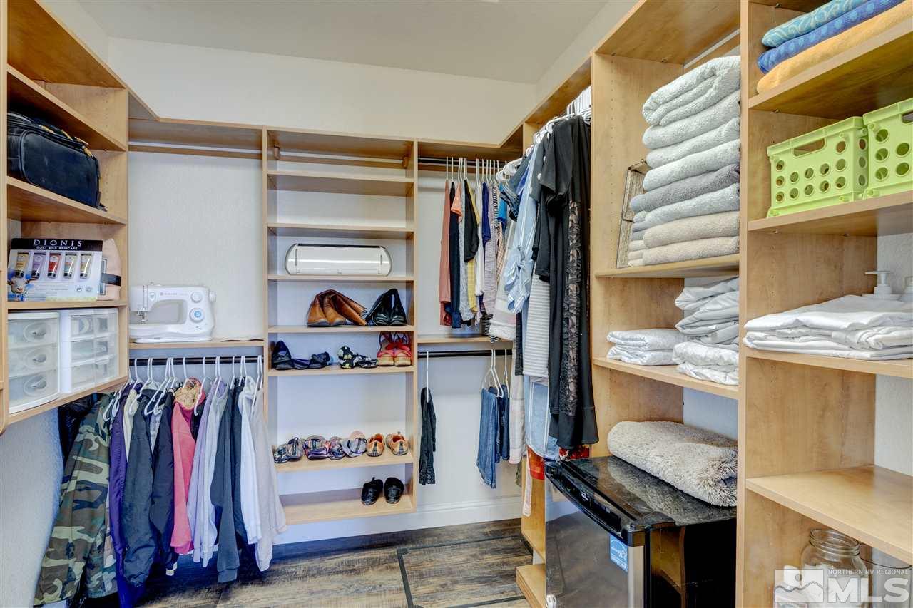 4925 Rancheria Road Fallon, NV 89406 - Photo 23 of 39 a view of walk in closet with clothes and shoes