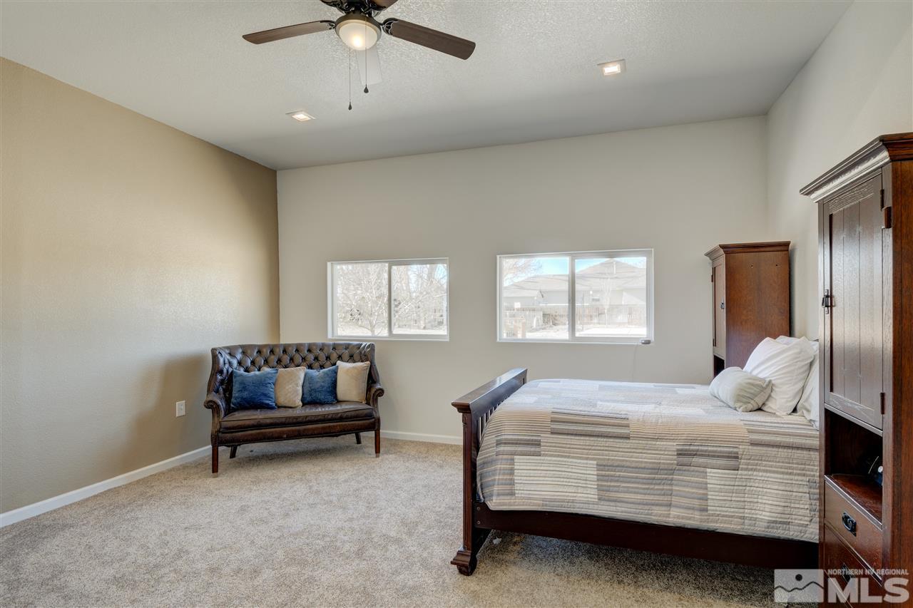 4925 Rancheria Road Fallon, NV 89406 - Photo 28 of 39 a bedroom with bed and window