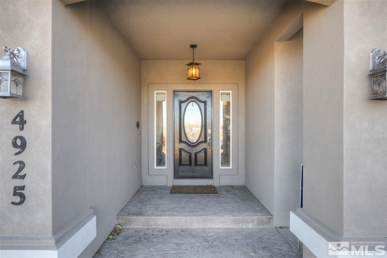 4925 Rancheria Road Fallon, NV 89406 - Photo 3 of 39 a view of a entryway door with wooden floor