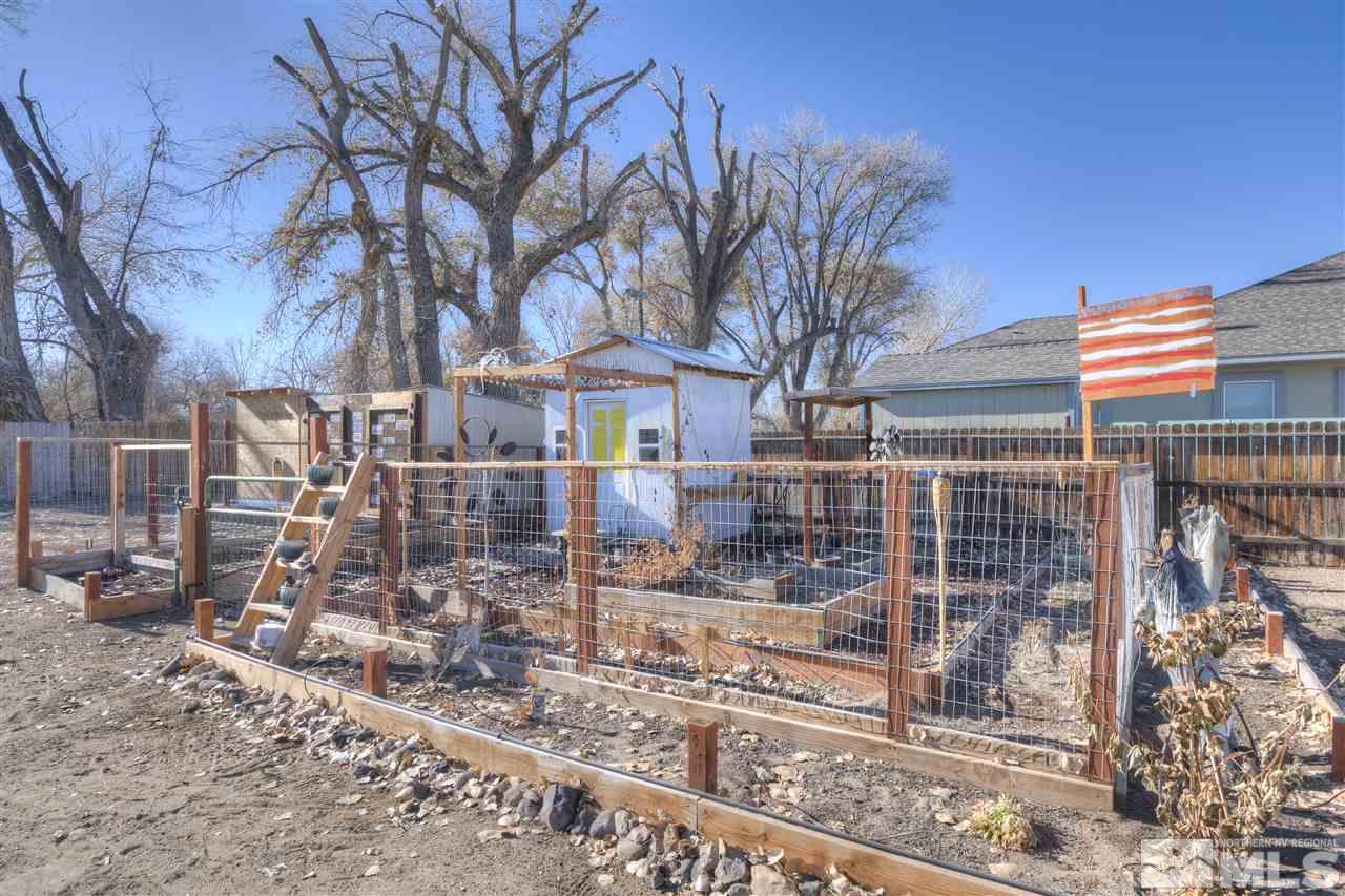 4925 Rancheria Road Fallon, NV 89406 - Photo 38 of 39 a view of a building with a yard