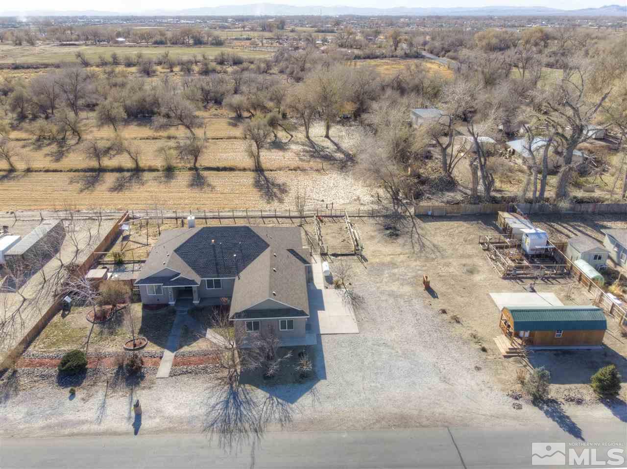 4925 Rancheria Road Fallon, NV 89406 - Photo 4 of 39 an aerial view of a houses with yard