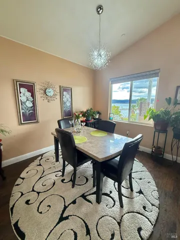 a view of a backyard of the house