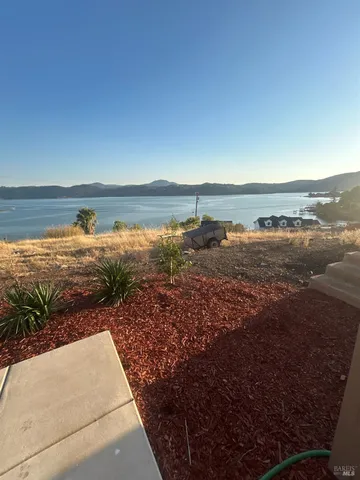 a view of a balcony with wooden floor