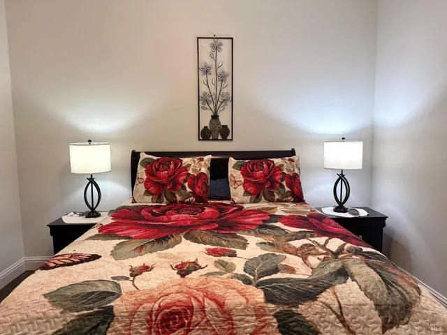 a white toilet sitting next to a shower curtain