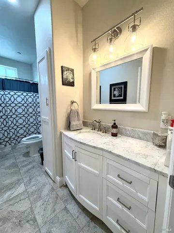 a view of house with backyard and glass window