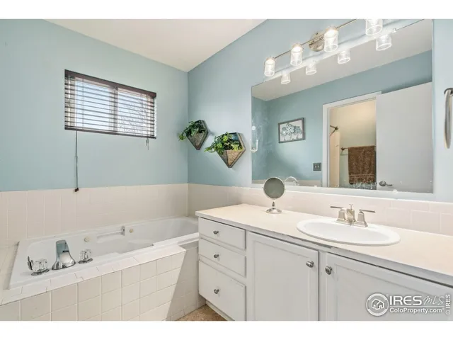 a view of room with furniture and wooden floor
