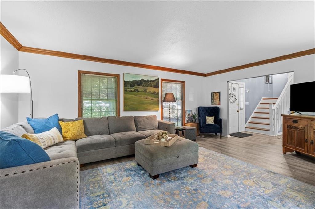 126 Firethorn Road Baden, PA 15005 - Photo 11 of 46 a living room with furniture and a flat screen tv