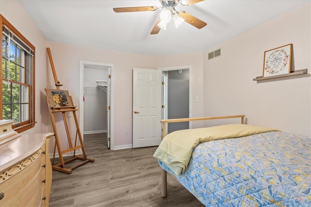 126 Firethorn Road Baden, PA 15005 - Photo 36 of 46 a bedroom with a bed and a flat screen tv