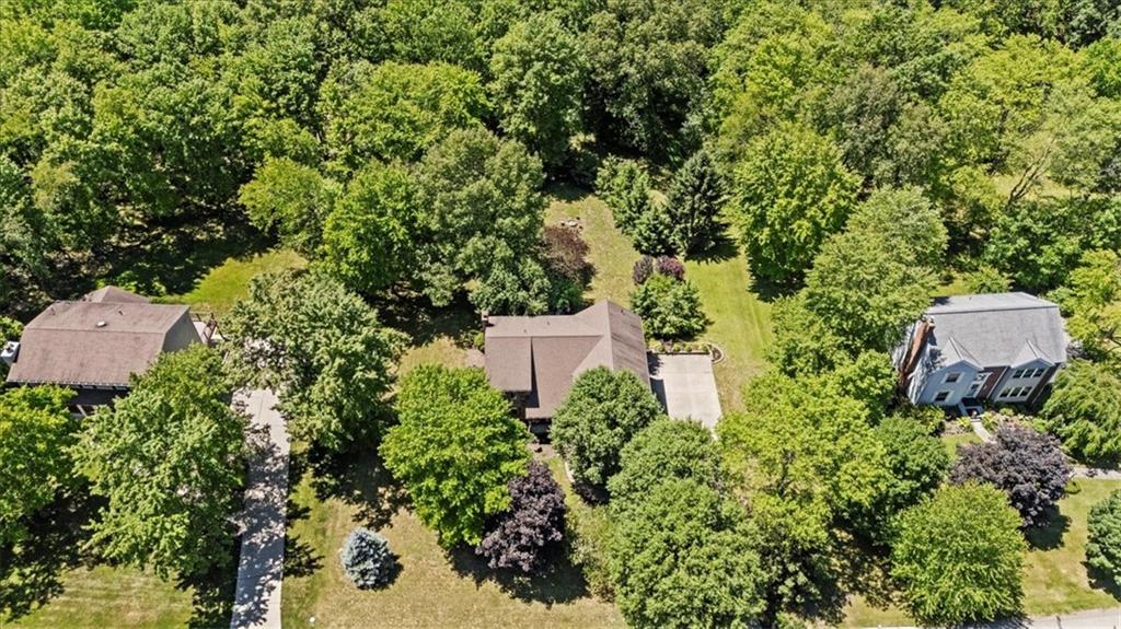 126 Firethorn Road Baden, PA 15005 - Photo 42 of 46 an aerial view of a house with a yard and large trees