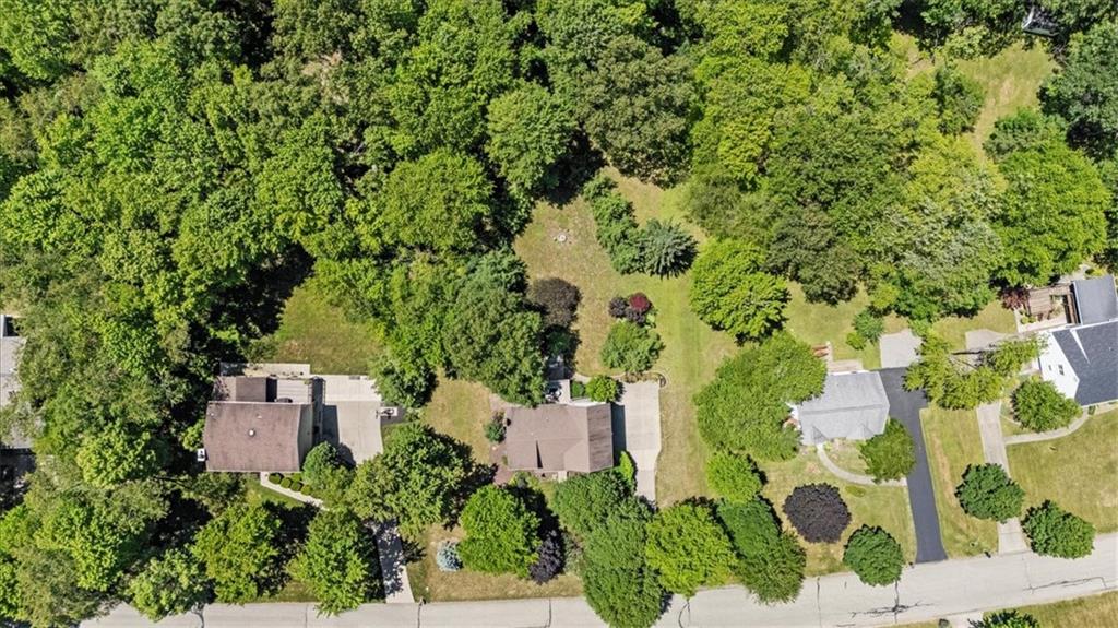 126 Firethorn Road Baden, PA 15005 - Photo 43 of 46 an aerial view of a house with a yard and garden