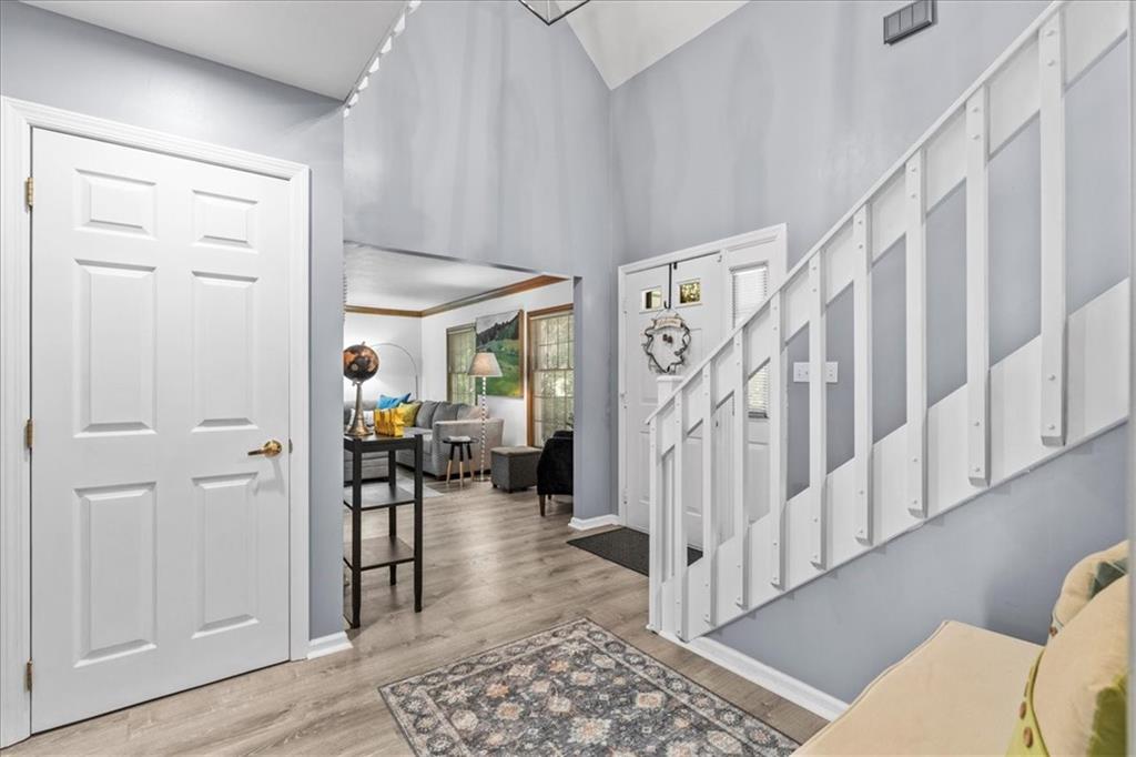 126 Firethorn Road Baden, PA 15005 - Photo 10 of 46 a view of entryway with livingroom and furniture