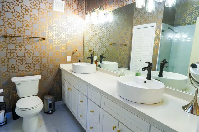 a view of house with yard and sitting area