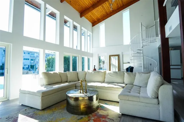 a living room with fireplace furniture and a fireplace