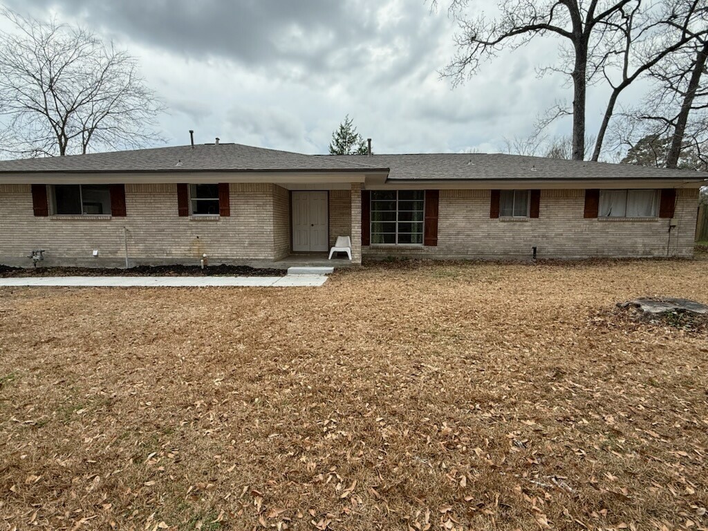 a front view of a house with yard