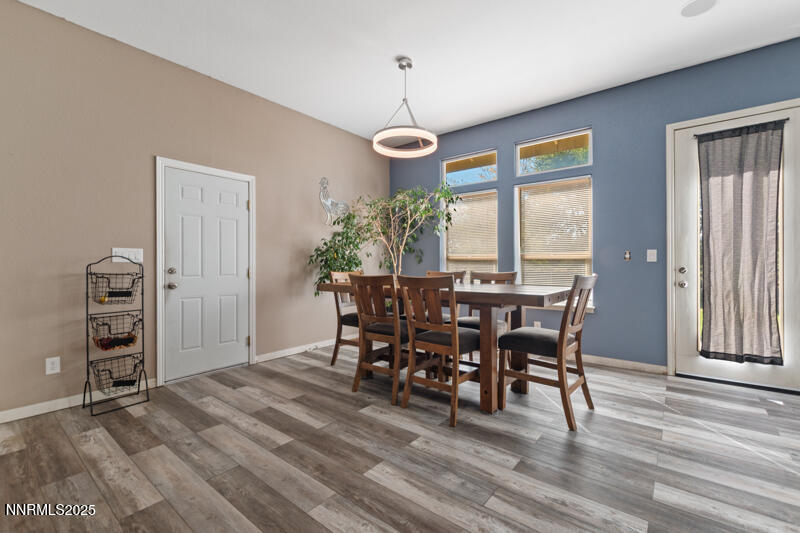 210 Nugget Avenue Dayton, NV 89403 - Photo 13 of 24 a view of a dining room with furniture and window