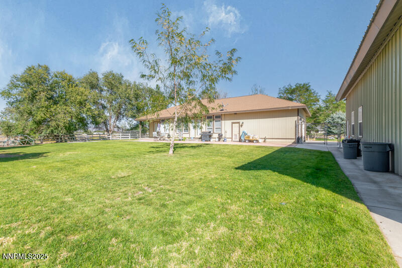 210 Nugget Avenue Dayton, NV 89403 - Photo 23 of 24 a view of a house with a yard
