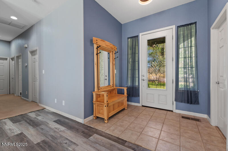 210 Nugget Avenue Dayton, NV 89403 - Photo 5 of 24 a view of an empty room and window