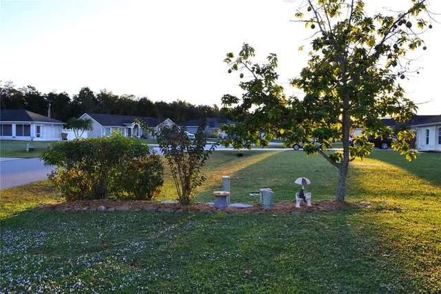 a bedroom with a bed and a television