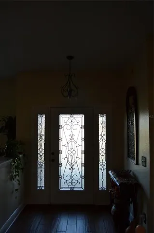 a kitchen with stainless steel appliances granite countertop a stove refrigerator and microwave