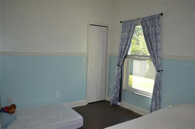 a view of a house with patio furniture and porch