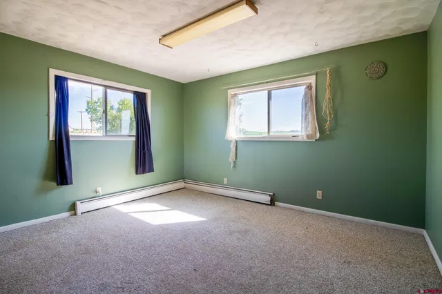 a view of an empty room with window