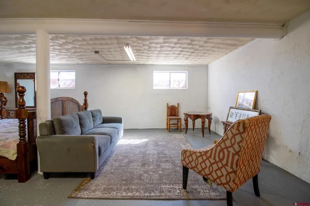 a living room with furniture and a couch