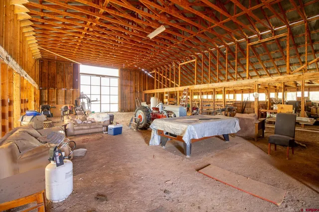 a outdoor space with lots of white furniture