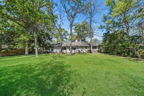 a view of a yard with a bench