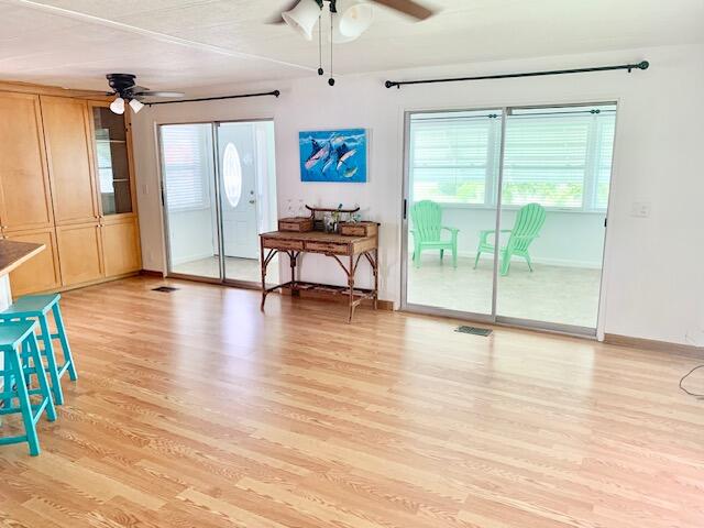808 South Silver Circle Key Largo, FL 33037 - Photo 10 of 50 a view of an empty room with glass door and windows