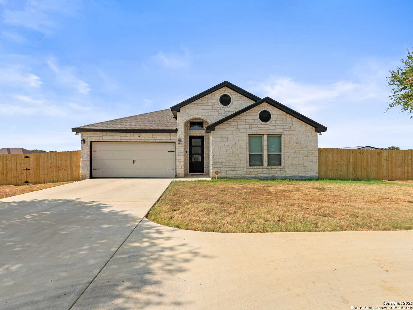 132 West Medium Meadow Drive Lytle, TX 78052 - Photo 1 of 46 a house with a outdoor space