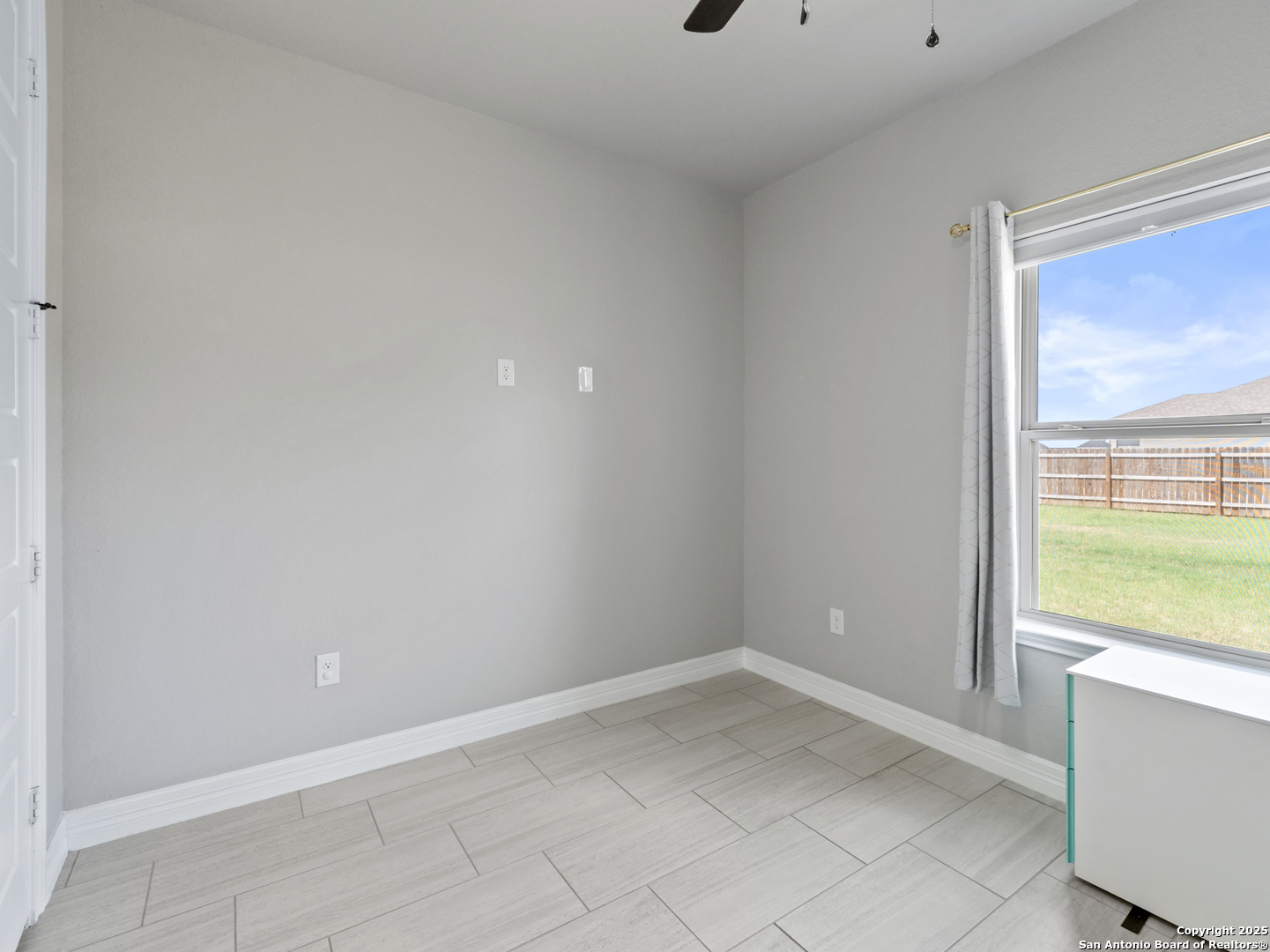 132 West Medium Meadow Drive Lytle, TX 78052 - Photo 19 of 46 a view of an empty room with a window