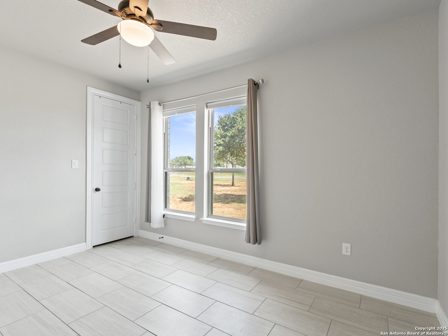 132 West Medium Meadow Drive Lytle, TX 78052 - Photo 21 of 46 a view of an empty room with a window