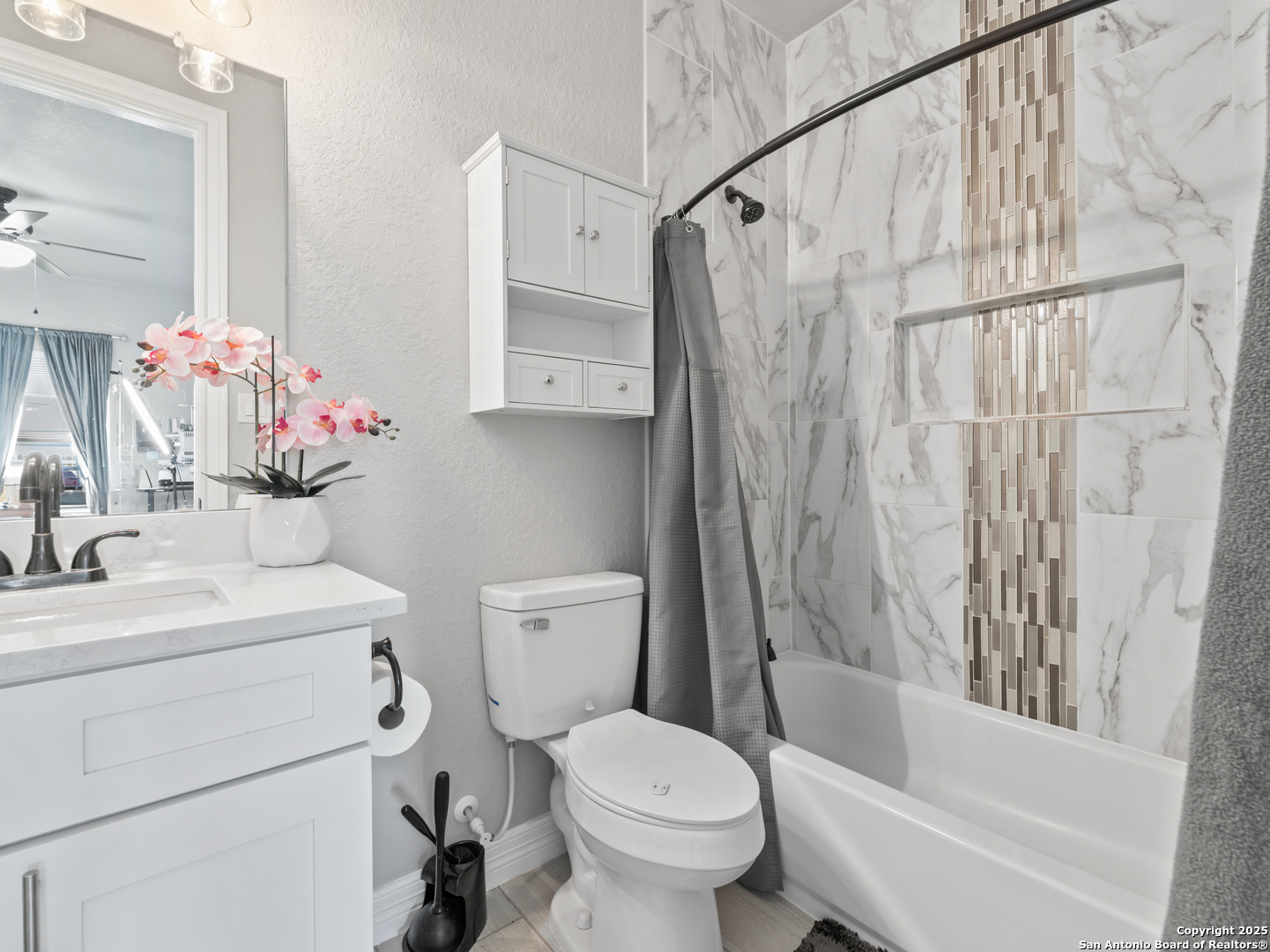 132 West Medium Meadow Drive Lytle, TX 78052 - Photo 22 of 46 a bathroom with a sink toilet and shower