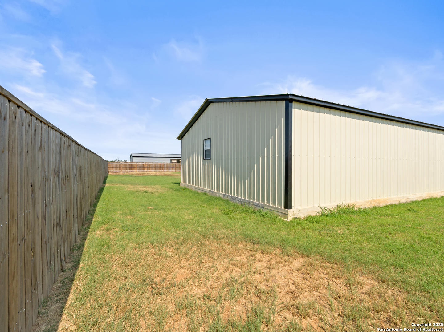 132 West Medium Meadow Drive Lytle, TX 78052 - Photo 44 of 46 a backyard of a house