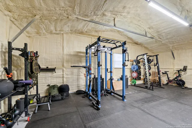 a view of a room with gym equipment