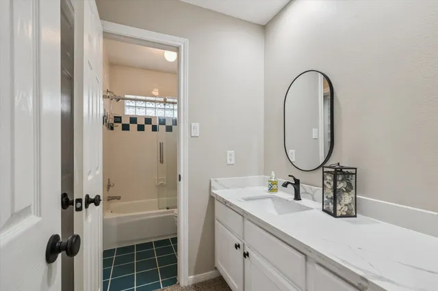 a view of a house with entrance gate