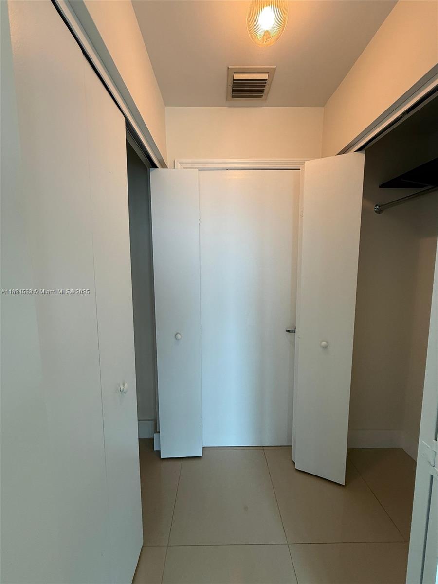 60 Southwest 13th Street, Unit 3809 Miami, FL 33130 - Photo 3 of 6 a view of a storage & utility room