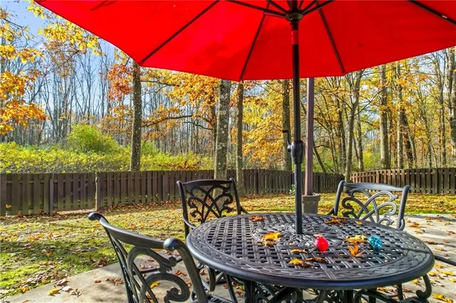 a view of a swimming pool with a patio