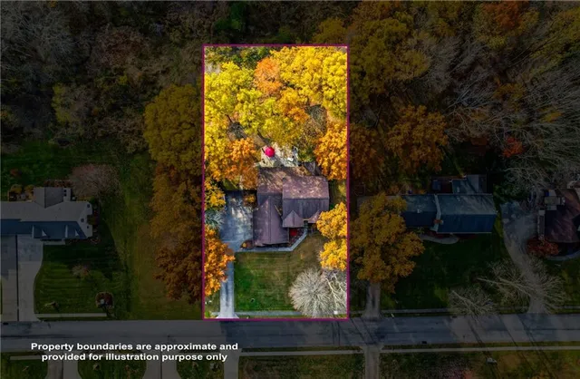 a living room with fireplace furniture and a wooden floor