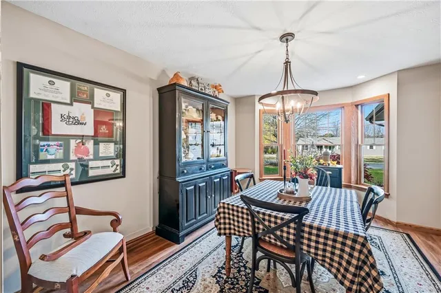 a bathroom with a sink a mirror and a toilet
