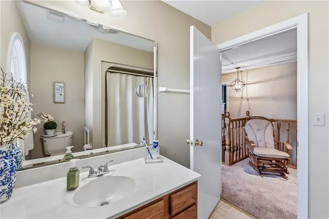 a bedroom with a bed and furniture