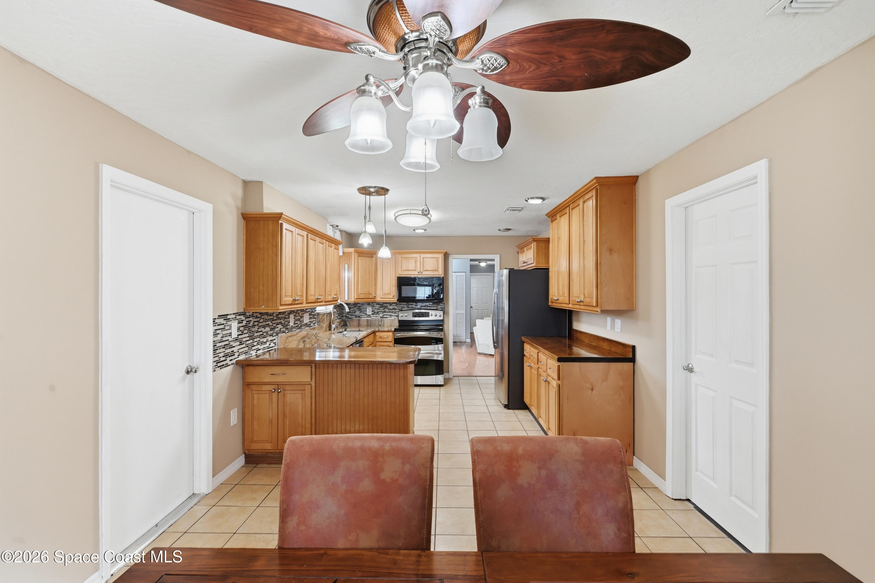 271 Hammock Road Southeast Palm Bay, FL 32909 - Photo 14 of 40 Dining to Kitchen