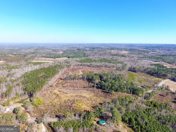 a view of a yard with an ocean beach