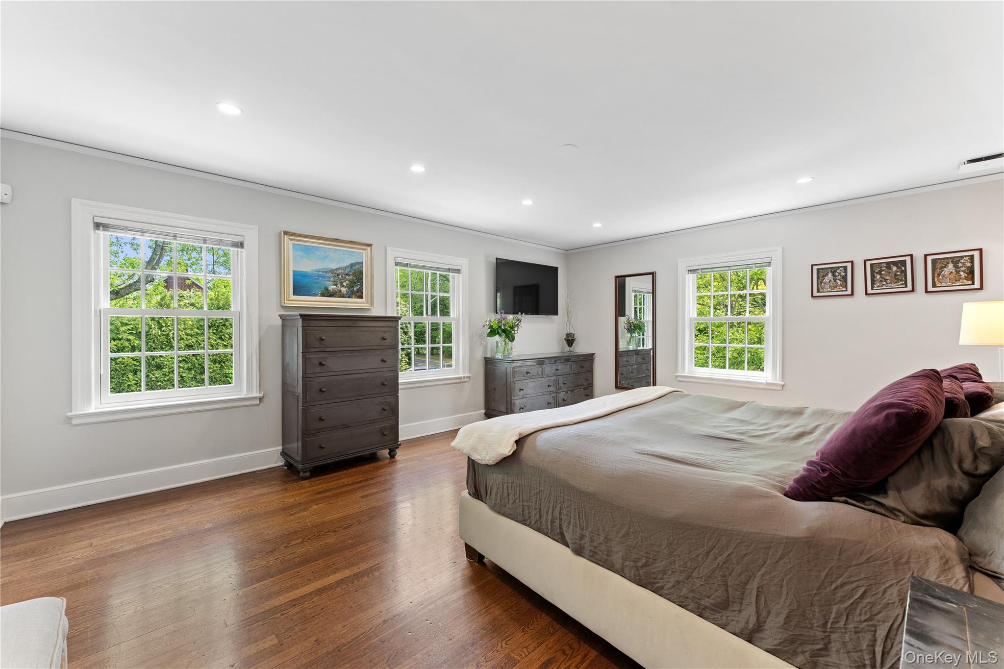 5 Harcourt Road Scarsdale, NY 10583 - Photo 14 of 44 Primary suite with multiple exposures and walk in closet custom outfitted by california closets